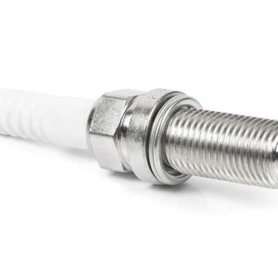Car iridium spark plug isolated on white background with clipping path